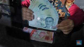 BI dan MAS Resmi Operasionalkan Kerangka Transaksi Mata Uang Lokal Indonesia-Singapura